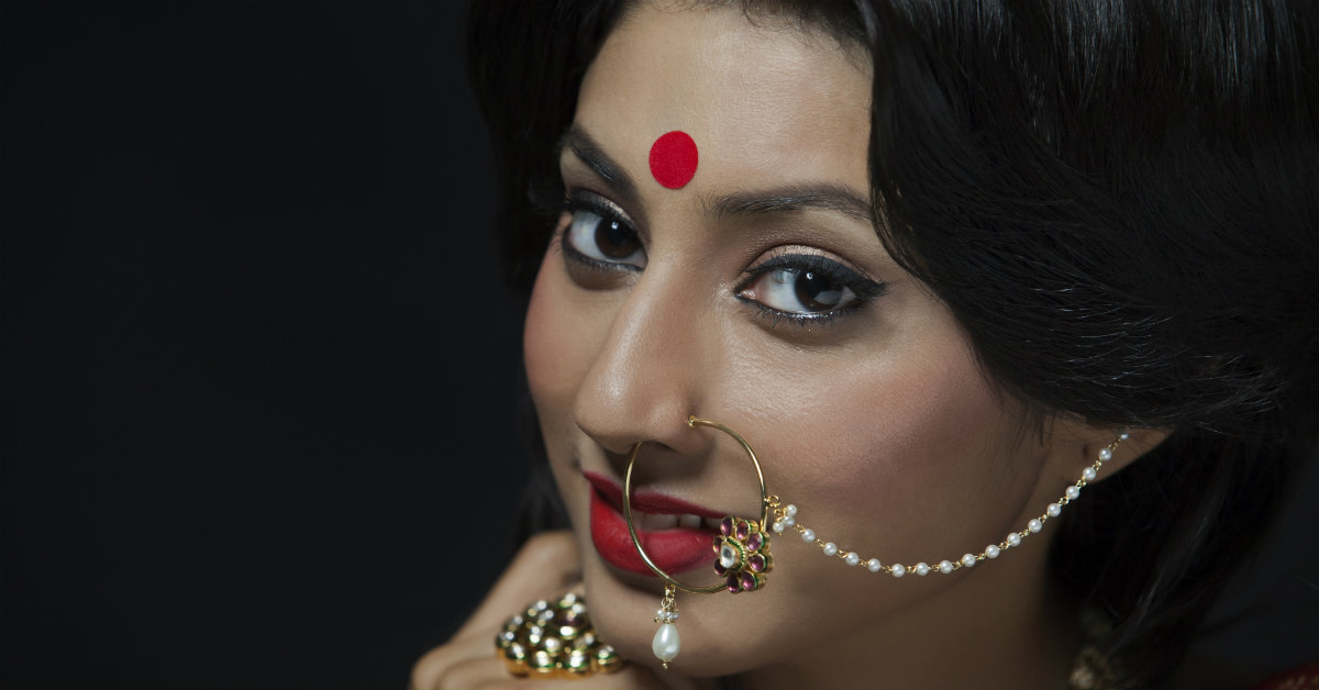 সোনার নথ পড়লেই কেল্লাফতে! (benefits of wearing gold nose rings)