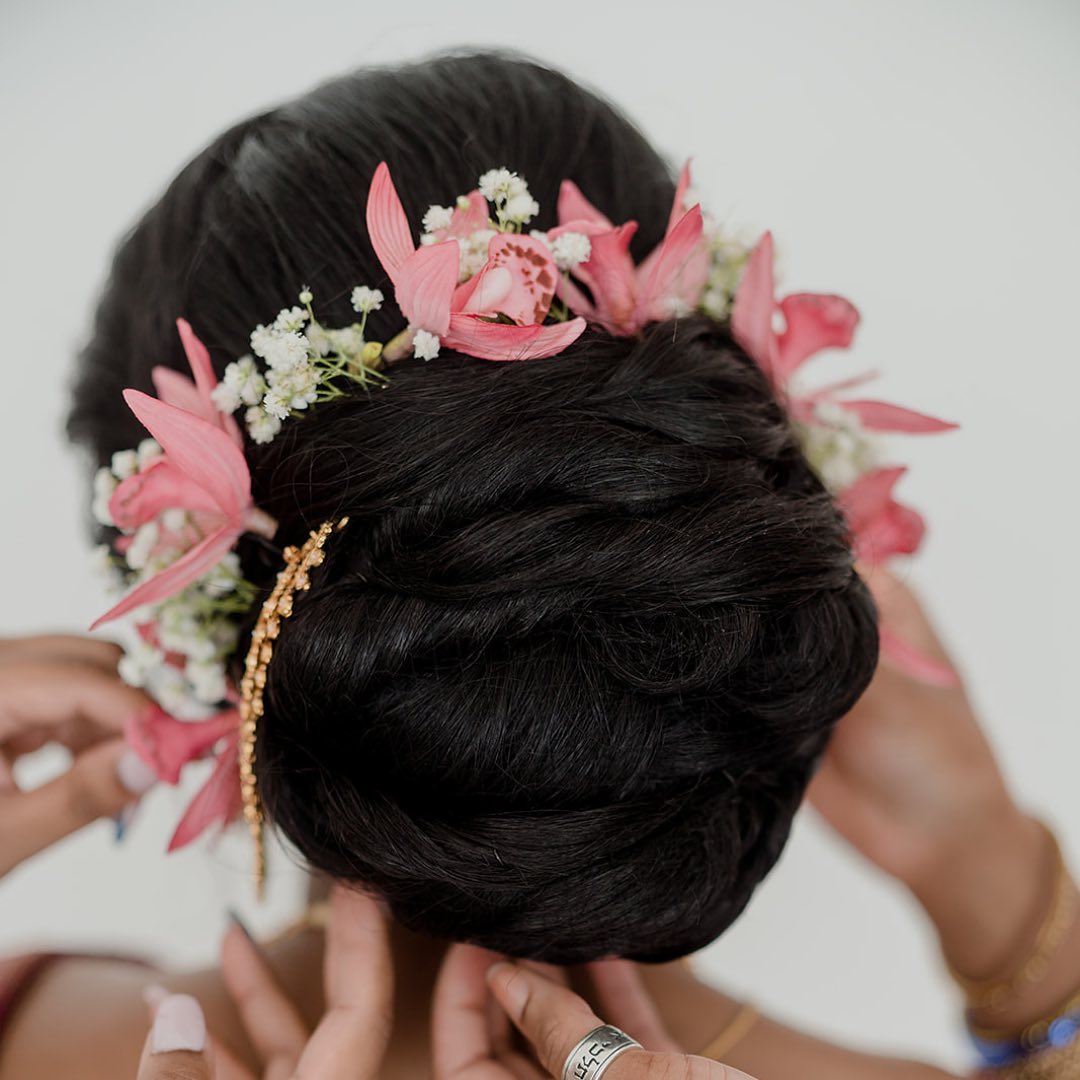 Classic Bridal bun Hairstyle with Flowers