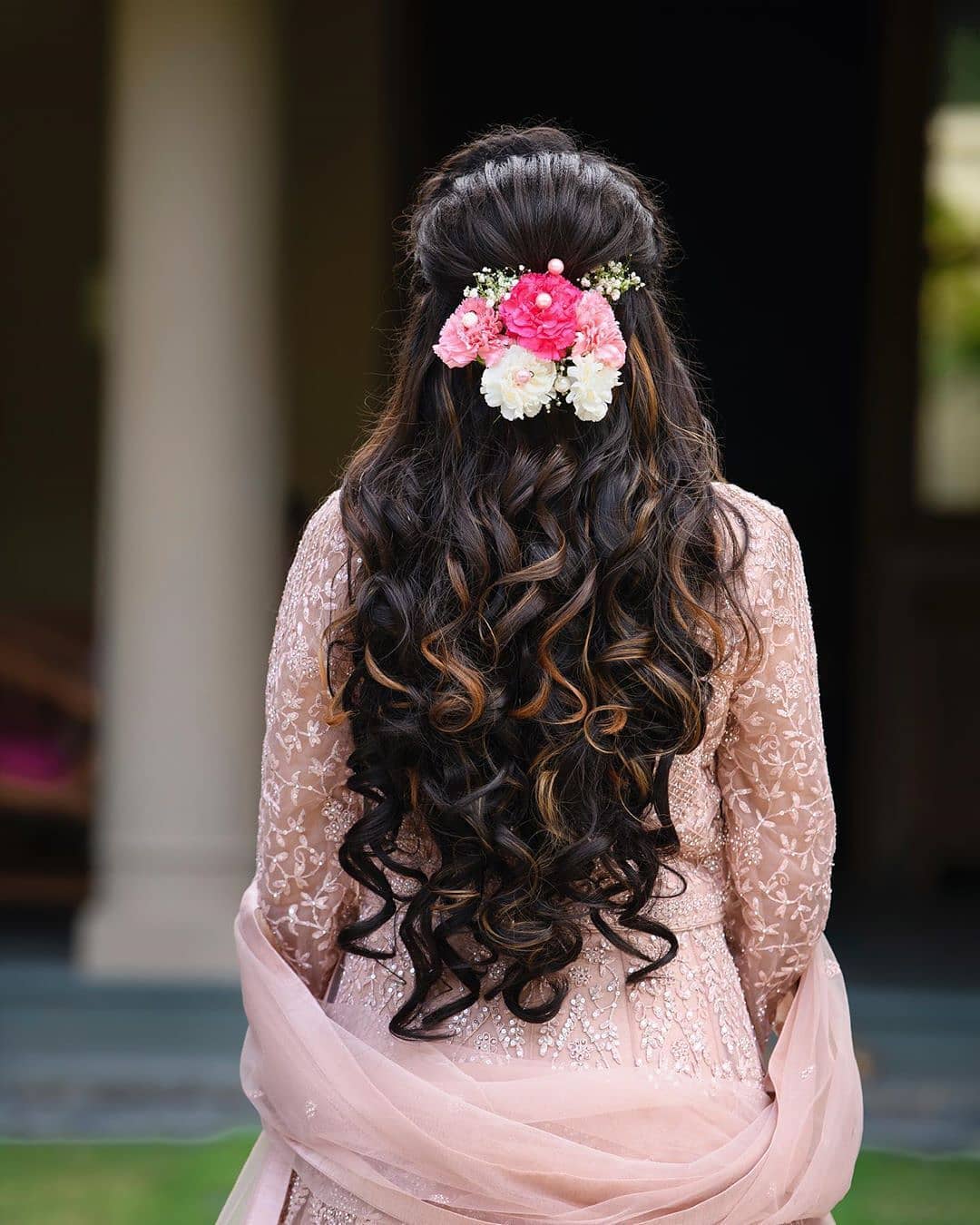 long curls with fresh florals