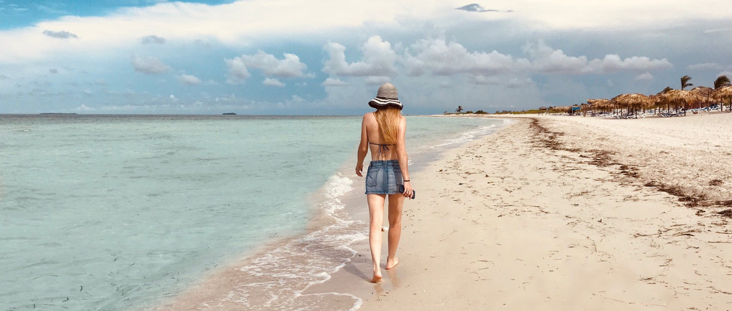 girl walking on beach