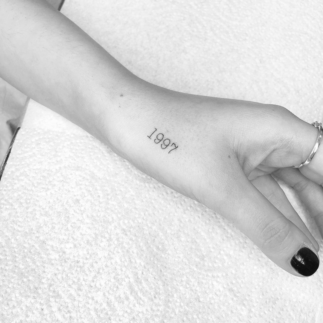 LEAH DAVINCIddsassociation on Instagram Classic birth year tattoo but  with an additional flare  I have literally a ton of tattoos to post