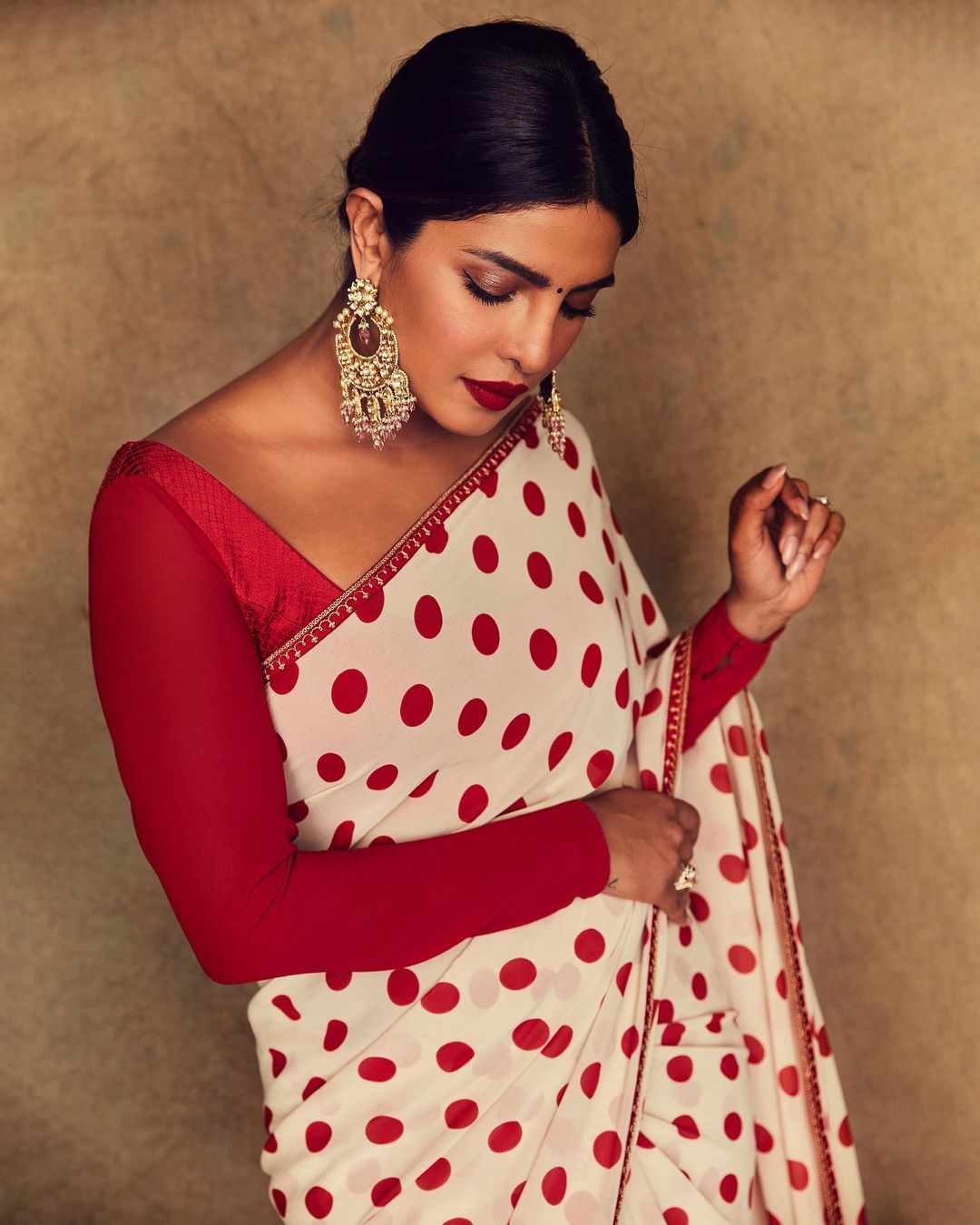 Stylish Indian Woman In Silk Saree And Nose Ring In A Side Pose Stock Photo  - Download Image Now - iStock