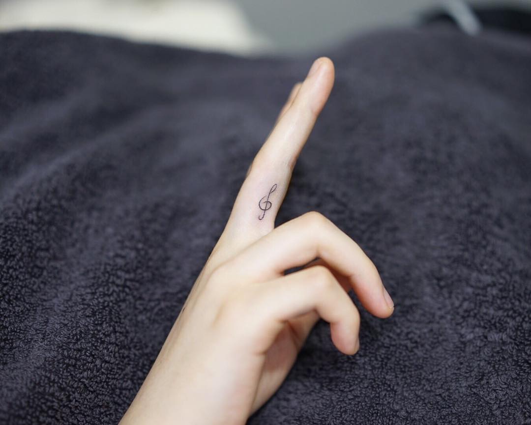 Simple Finger Tattoos - Musical Note Tattoo