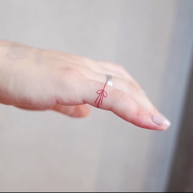 Unique Ring Tattoos - Ribbon Ring Tattoo