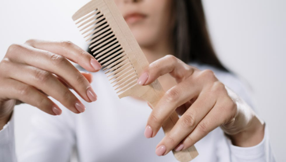 All The Benefits Of Switching From A Hair Brush To A Wooden Comb | POPxo