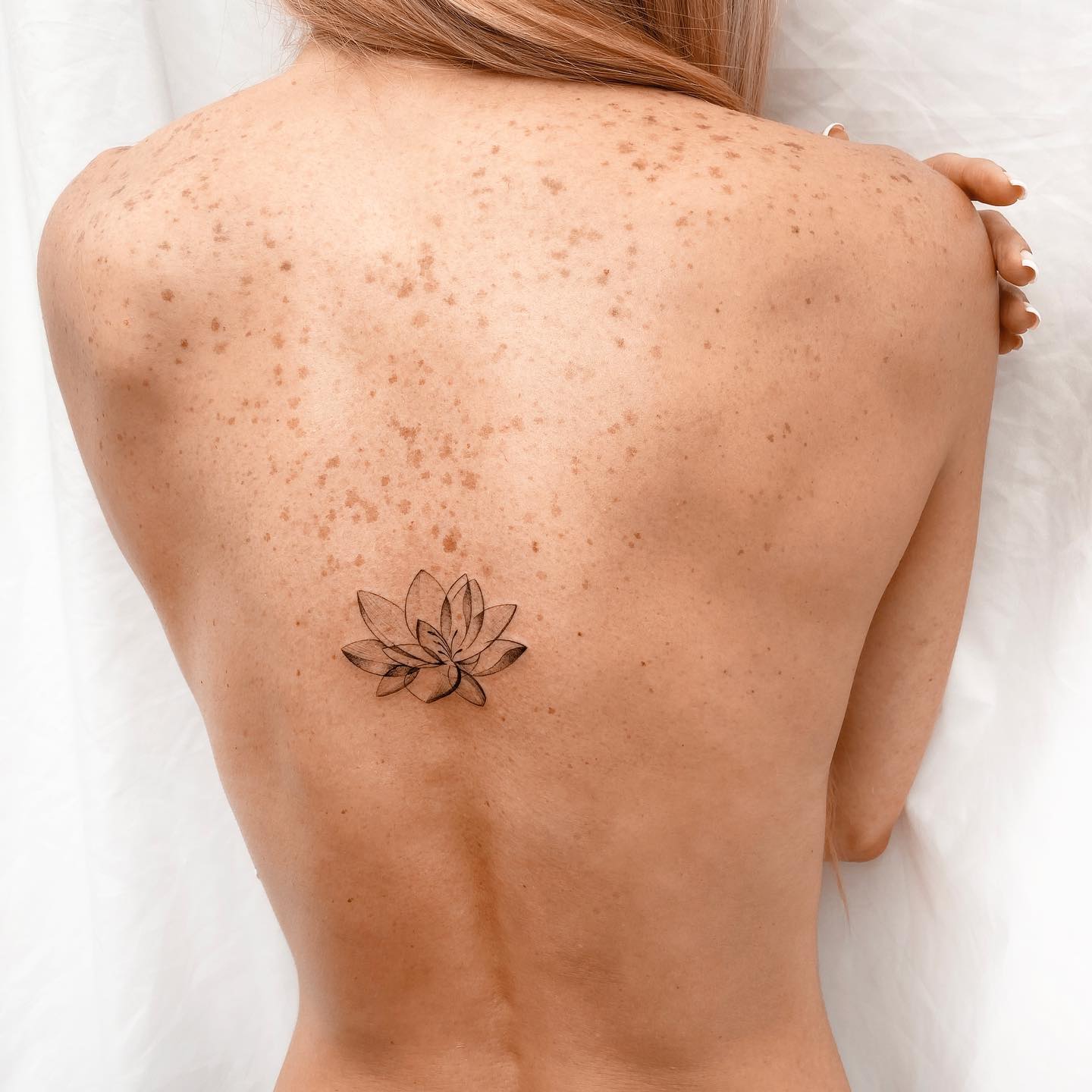 Classy and Feminine Small Back Tattoos