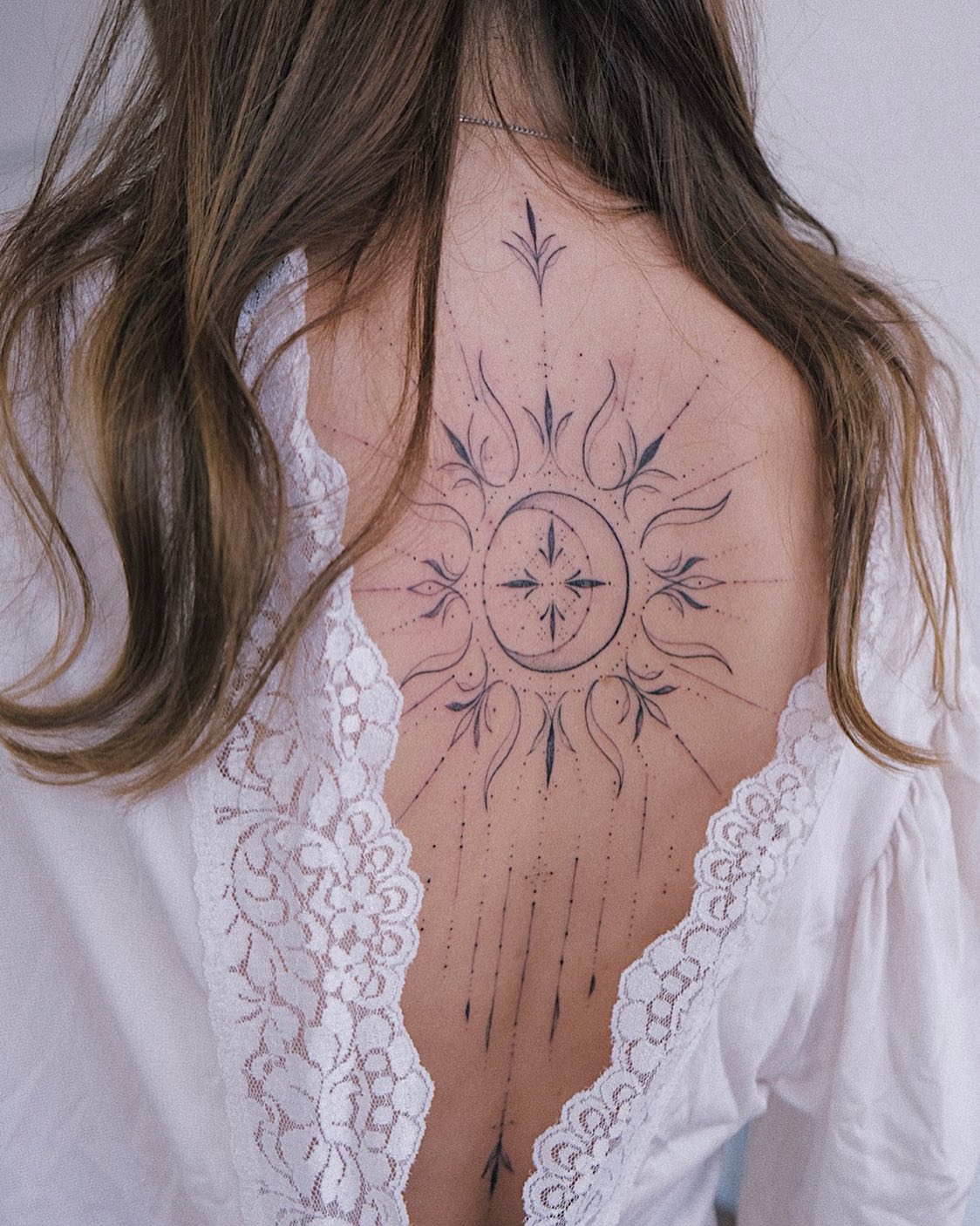 moon sun astrology tattoo design back spine  Round the World Magazine