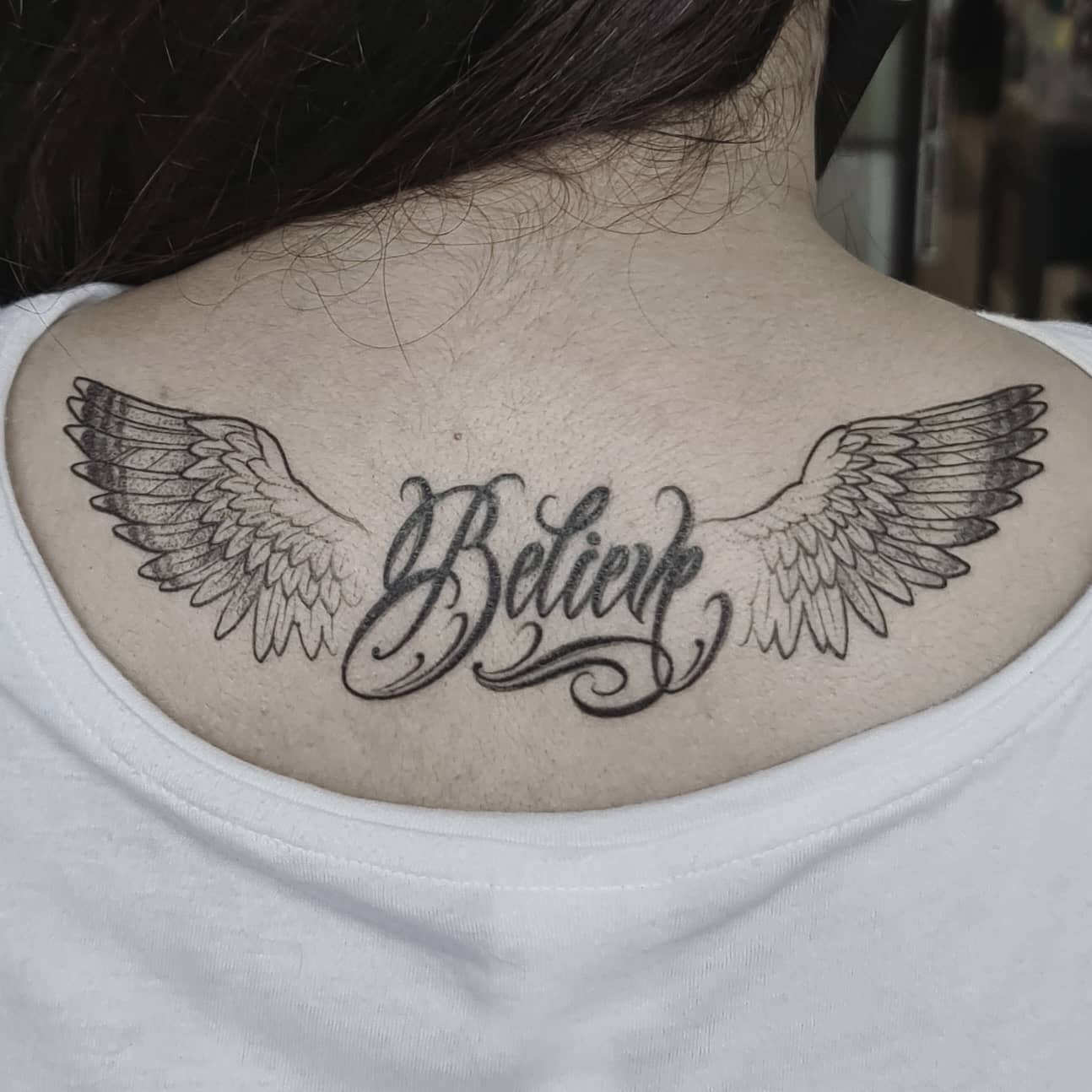 blessed tattoos with wings