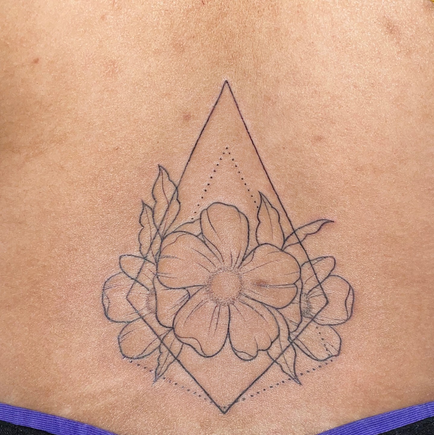 Frangipani lower back tattoo by jayblum on DeviantArt