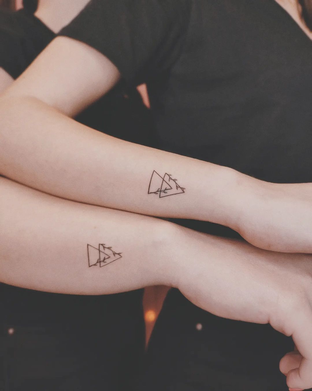 What is the meaning behind the double triangle symbol? | Symbols | Triangle  tattoo meaning, Tattoos with meaning, Triangle tattoo