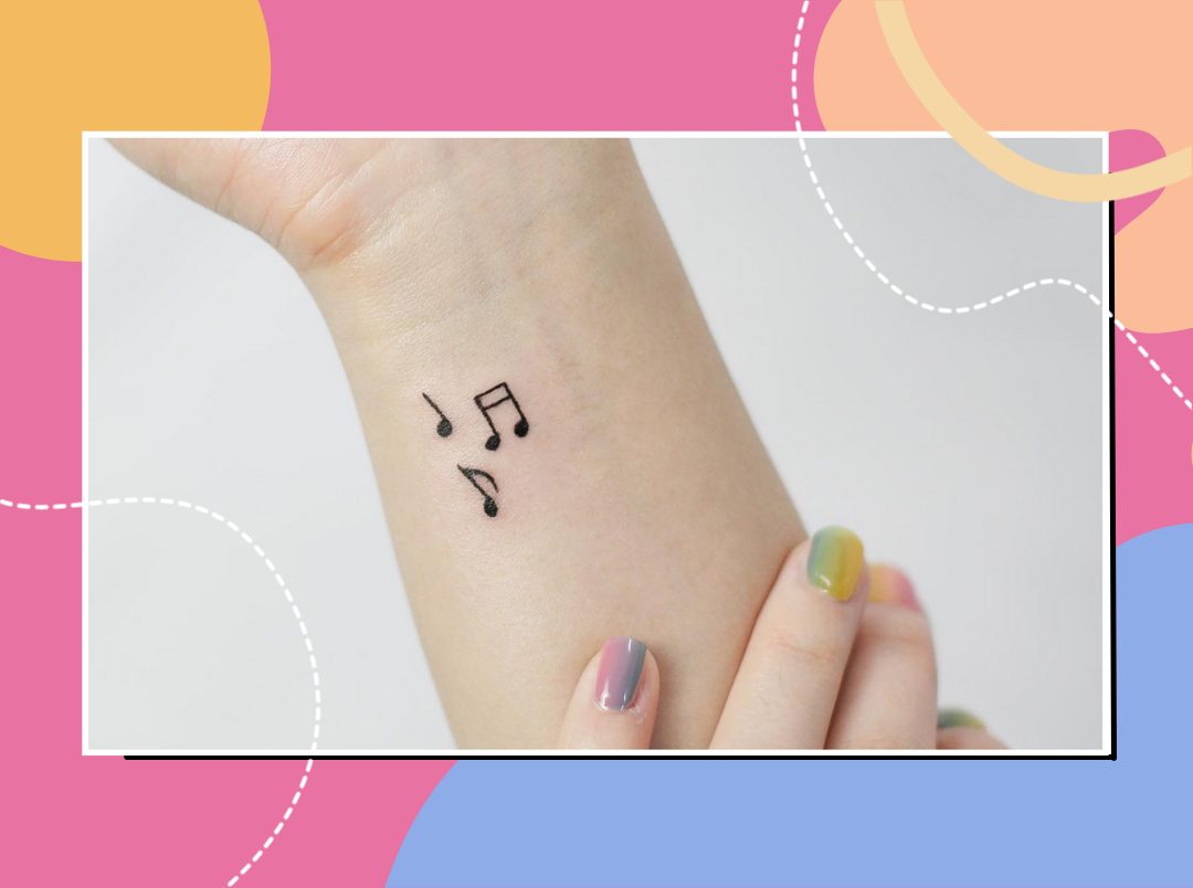 heart shaped music notes tattoo