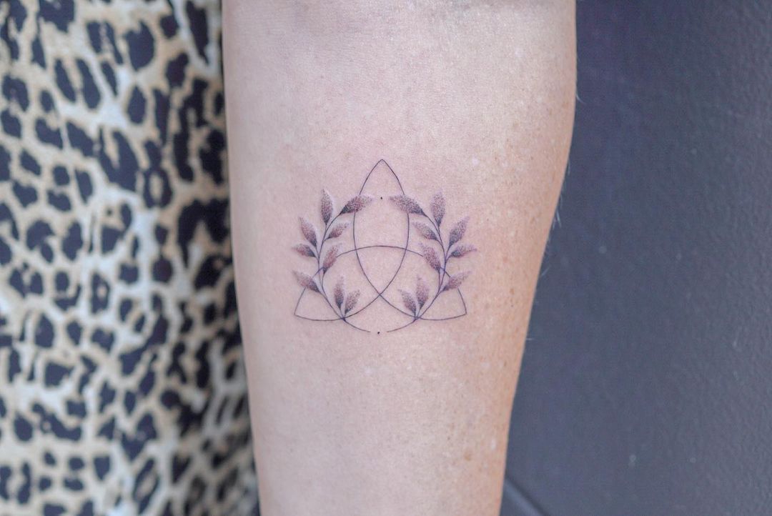 Flower and triangle tattoo by Ilayda Atlas  Tattoogridnet