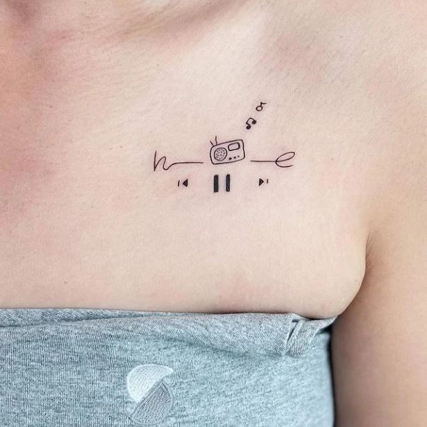 A quarter rest music note symbol tatooed on the inner | Small music tattoos,  Violin tattoo, Music tattoo designs