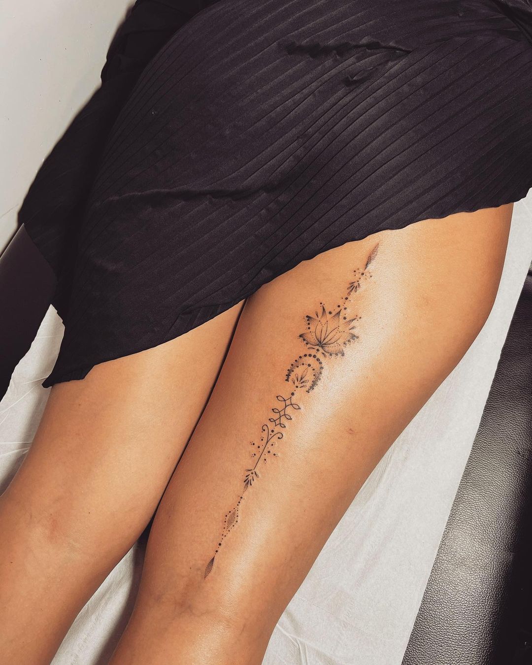 Filigree lace thigh tattoo by Larissa long