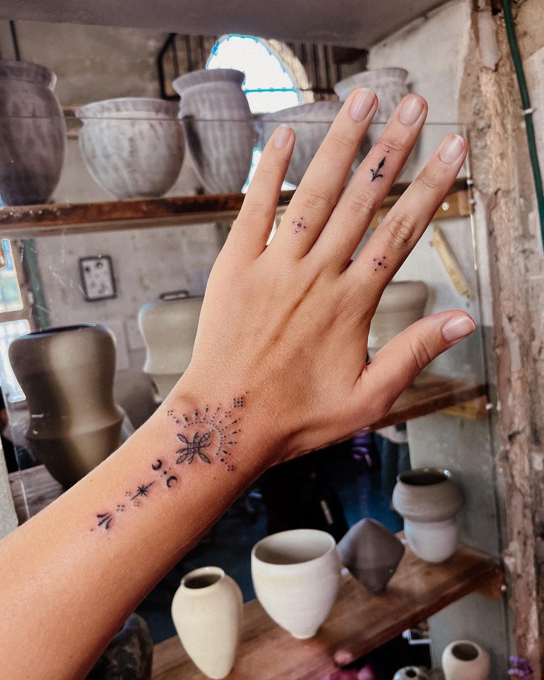 Black simple blessed tattoo on innwer wrist