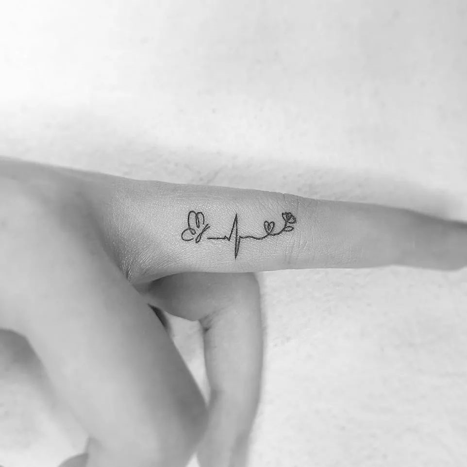 8 Heartbeat Tattoo Designs That are Worth Trying  Heartbeat tattoo  Heartbeat tattoo design Ekg tattoo