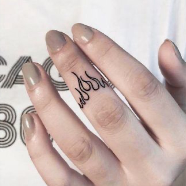 Finger tattoos.