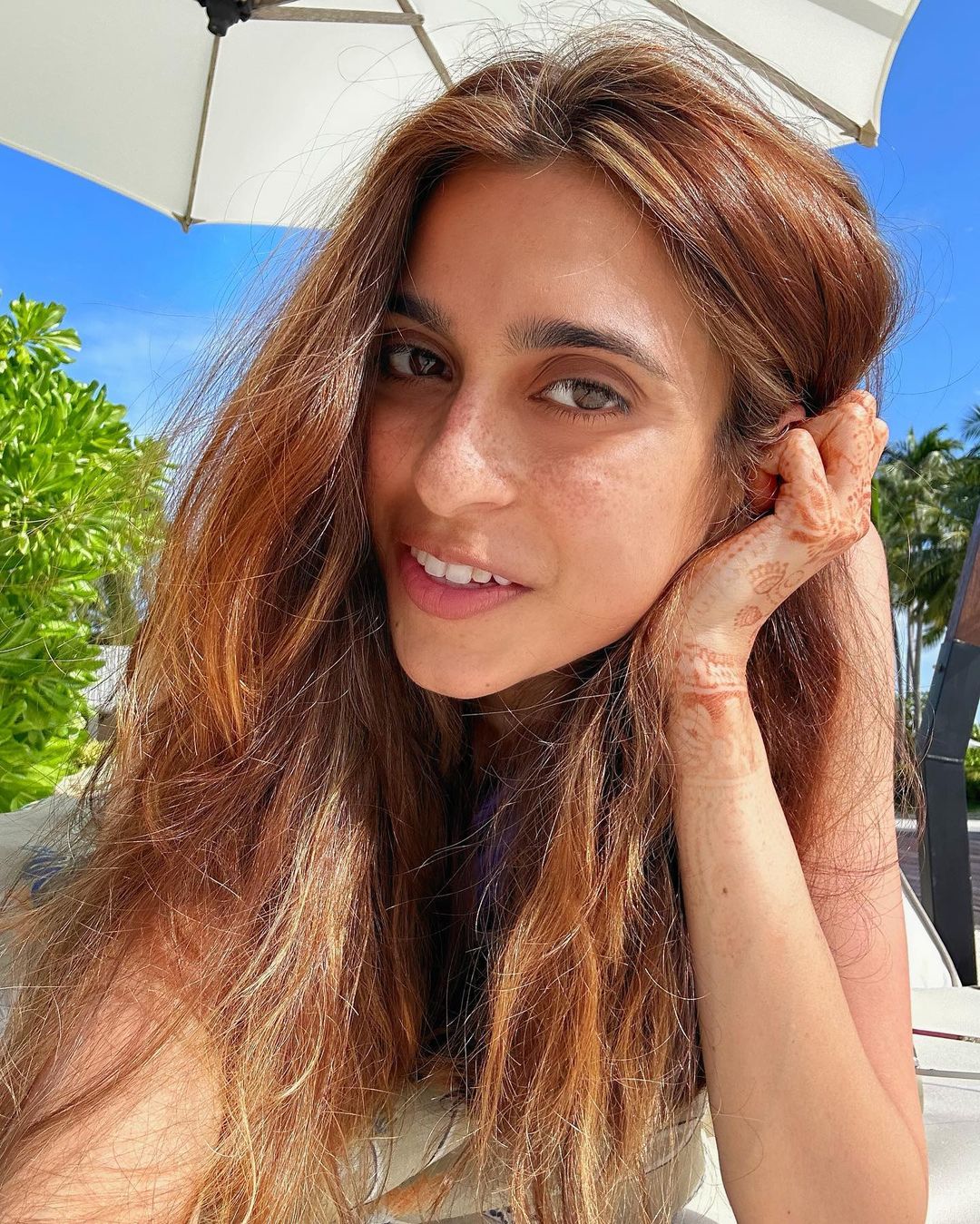 Shloka Mehta’s Sister Flaunts Henna-Covered Hands In A Bikini & We Are
