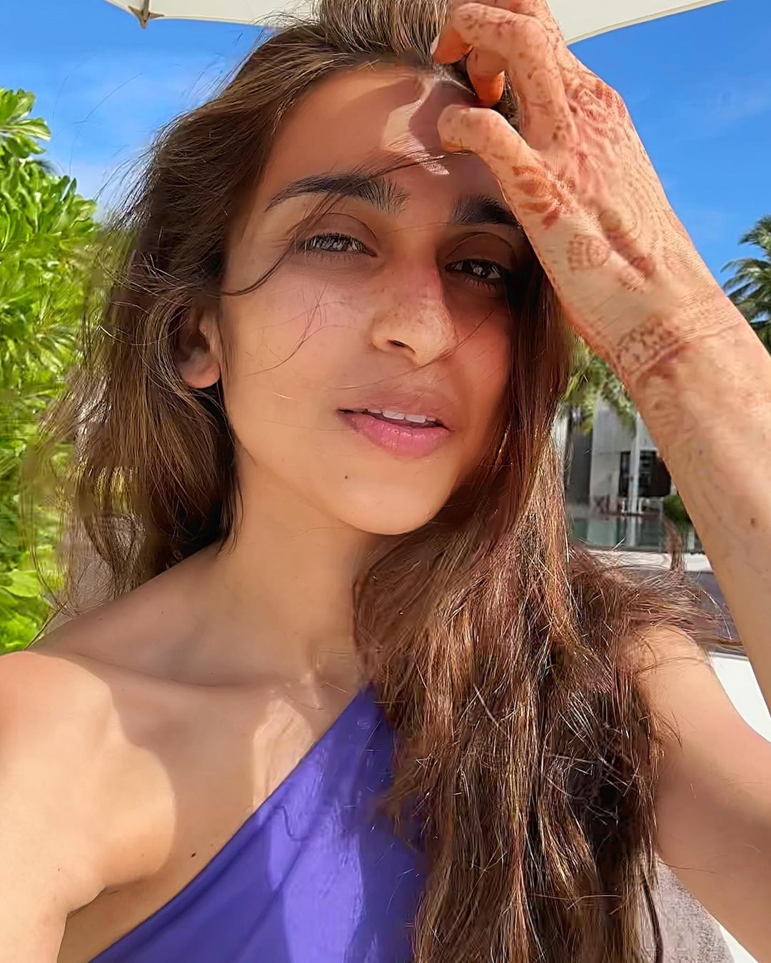 Shloka Mehta’s Sister Flaunts Henna-Covered Hands In A Bikini & We Are