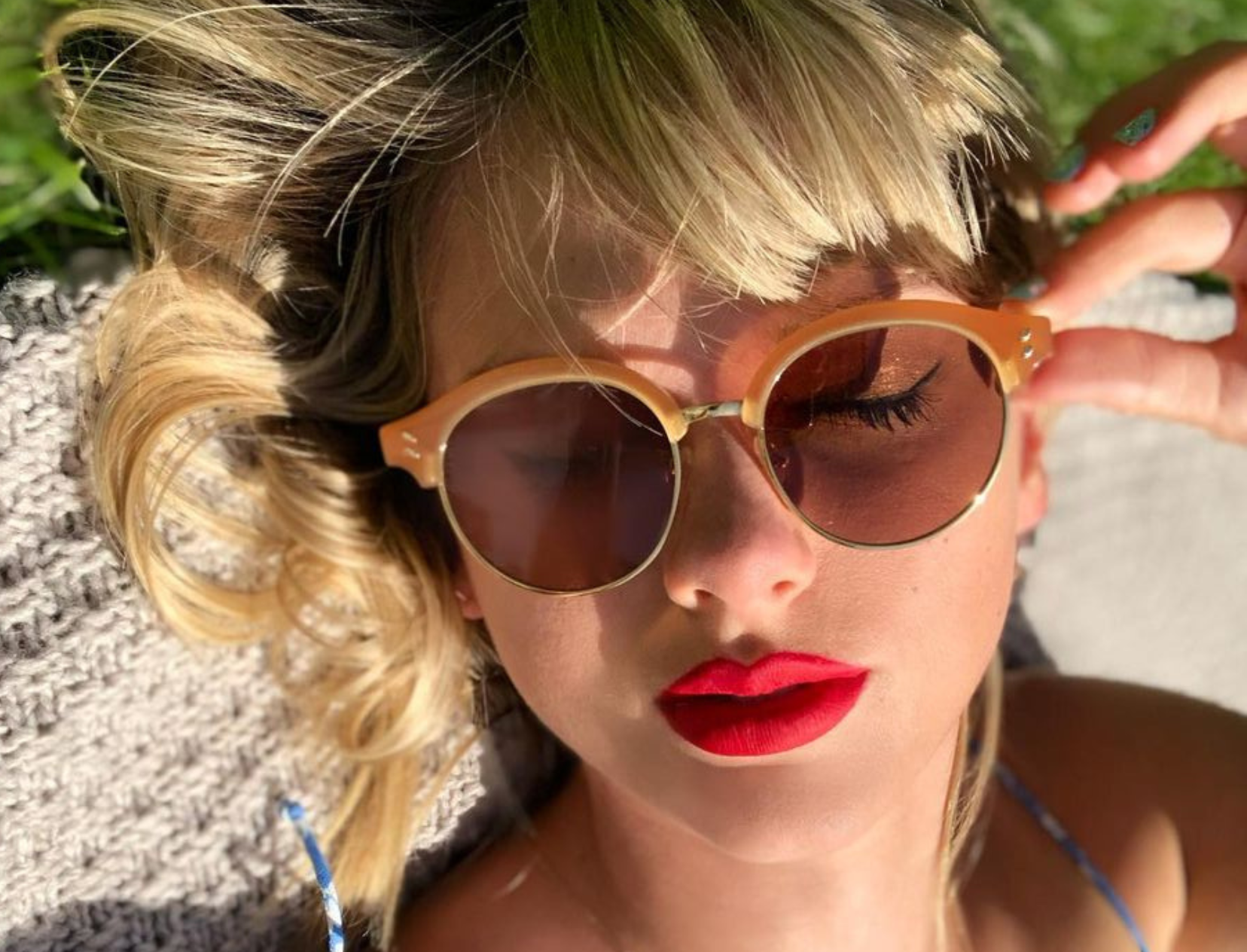 The Exact Lipsticks Taylor Swift Uses For Her Iconic Red Pout